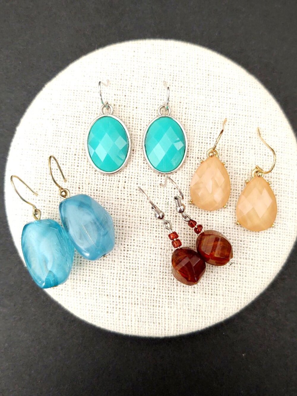 Bundle of peach, brown, blue-green and blue earrings